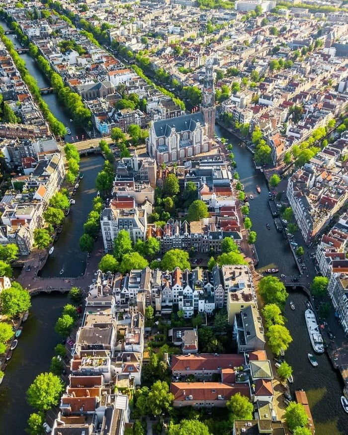 Amsterdam canal belt: the iconic narrow canal houses and bridges that define one of Europe's most beautiful cities