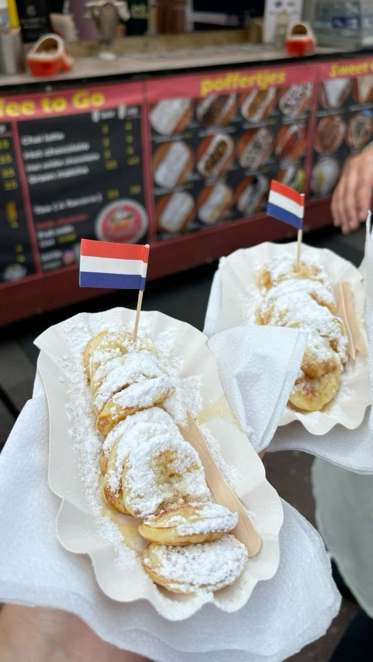 A traditional Dutch brown cafe (bruine kroeg) in Amsterdam: dark wood, cold beer, bitterballen and local conversation