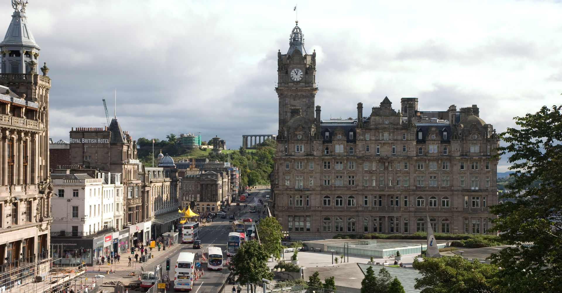 Arthur\'s Seat in Edinburgh: the ancient volcanic summit of Holyrood Park, with the city spread below and the Firth of Forth in the distance