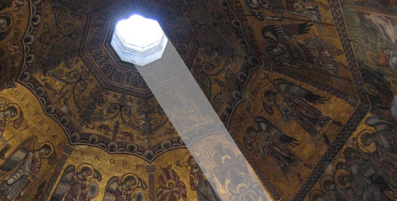 The white marble solstice marker on the floor of the Cappella della Croce in Florence Cathedral, illuminated by the gnomon