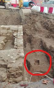 Archaeological excavations in Piazza Beccaria, Florence, revealing the Roman necropolis and medieval walls during tramway construction