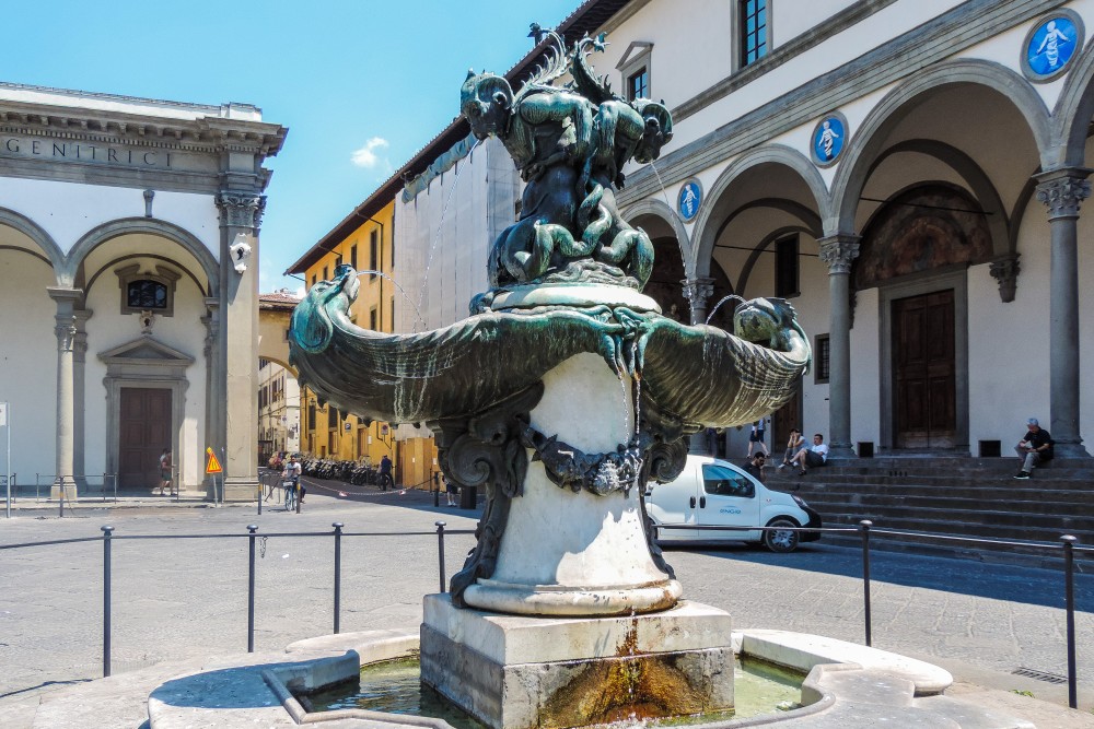 The harmonious Renaissance square of Piazza della Santissima Annunziata in Florence, with Palazzo Budini Gattai on the left