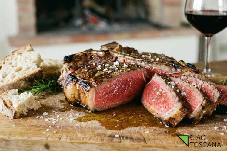 A traditional Florentine meal featuring bistecca alla fiorentina, ribollita, a bottle of Chianti Classico and cantucci biscuits with Vin Santo