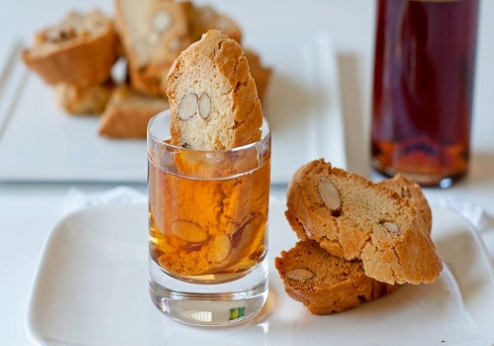 Cantucci almond biscuits and a glass of Vin Santo, the traditional sweet wine of Tuscany