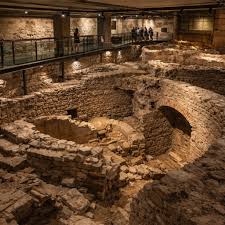 The excavated remains of the Roman Theatre of Florentia beneath the historic centre of Florence, dating to the first and second centuries AD
