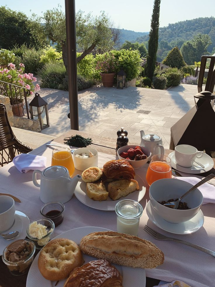 A vibrant Provencal morning market overflowing with local produce, olives, lavender honey and artisan cheeses