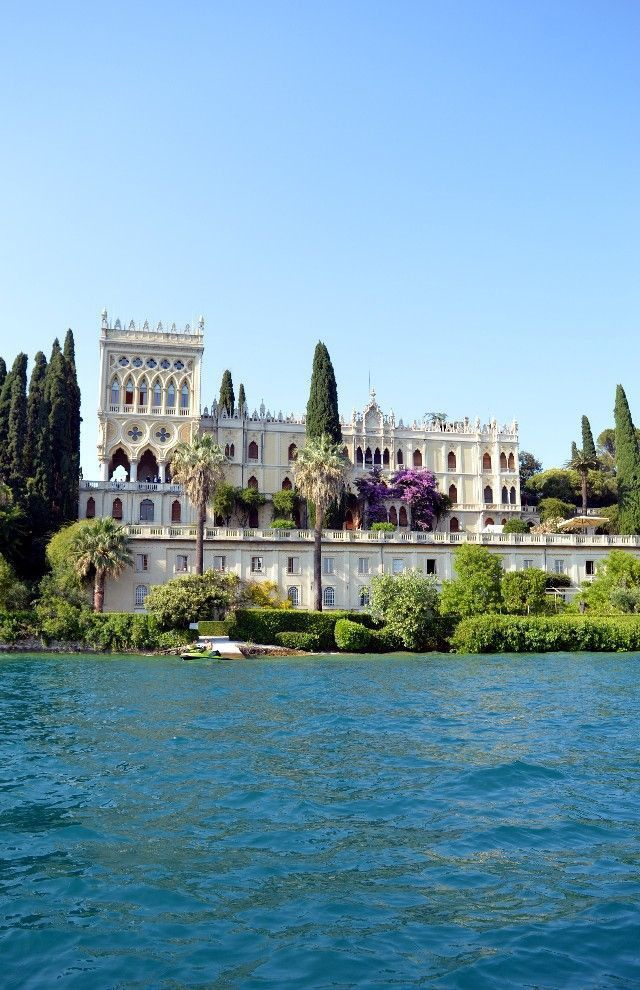 The crystal-clear waters of Lake Garda with the mountains rising dramatically from the northern shore, one of the most beautiful lake landscapes in Europe