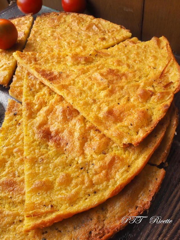 A freshly baked farinata, the crispy chickpea pancake that is the quintessential Genoese street food