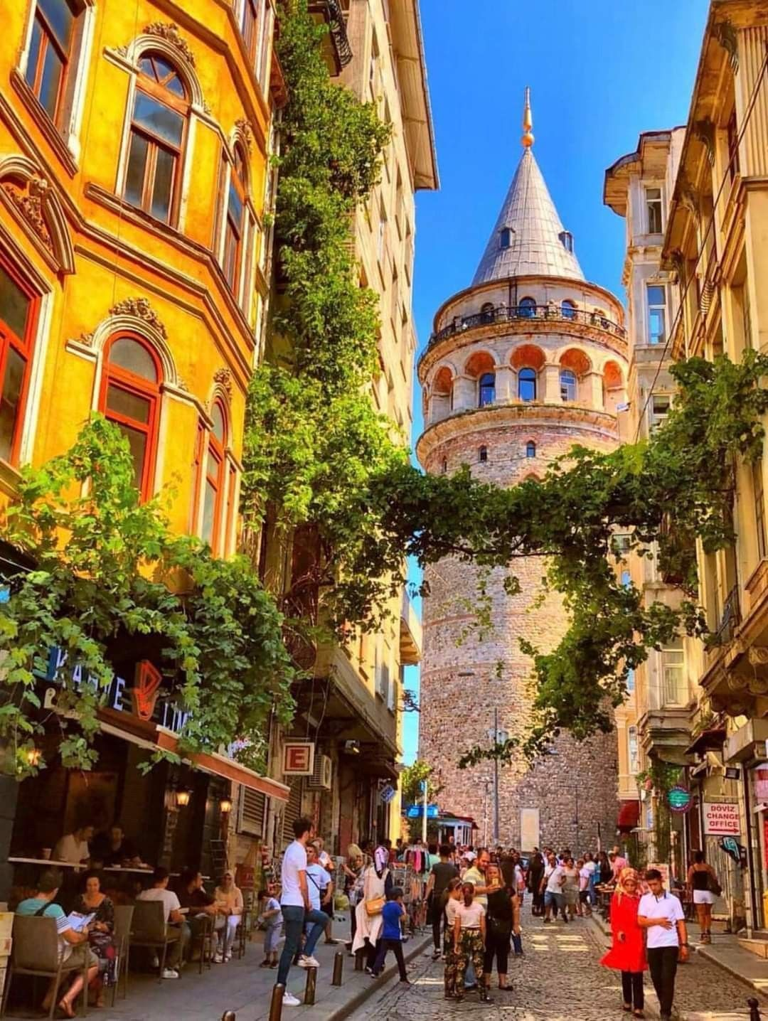 The glittering Bosphorus Strait in Istanbul with the Dolmabahce Palace and the Bosphorus Bridge spanning between Europe and Asia