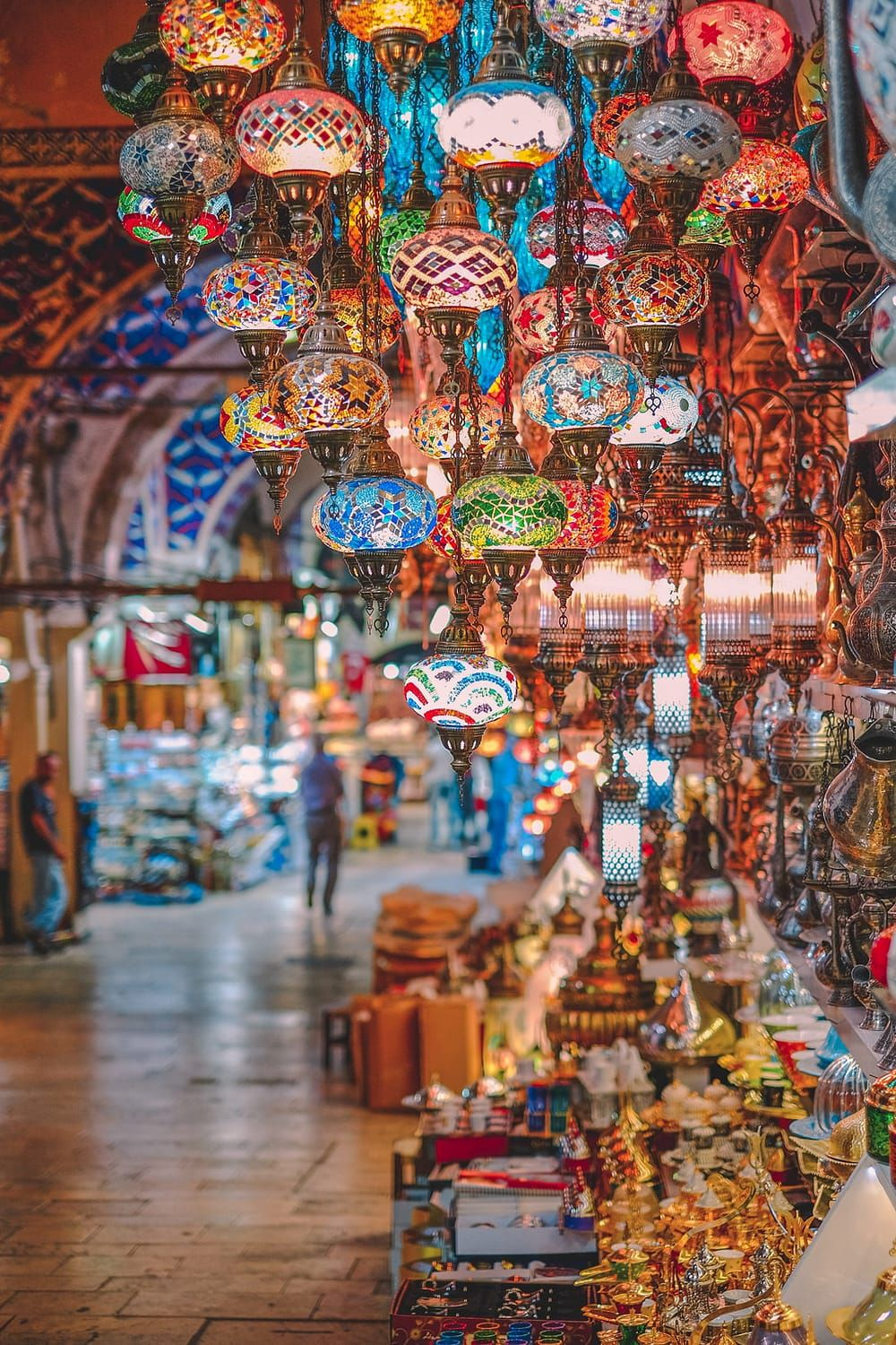 The bustling interior of the Grand Bazaar in Istanbul with its famous arched ceilings and thousands of shops selling carpets, jewellery, ceramics and spices