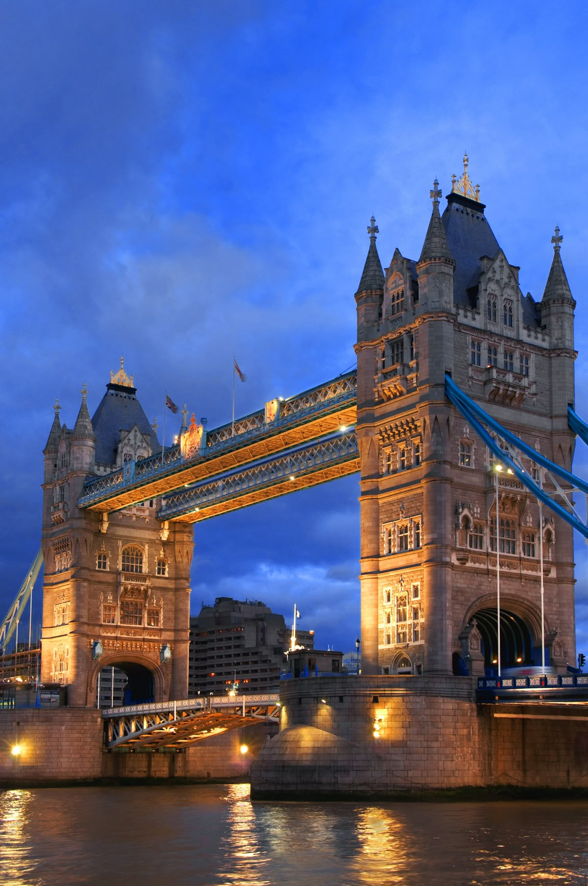 The iconic Tower Bridge spanning the River Thames in London at dusk, one of the most recognised structures in the world and free to walk across