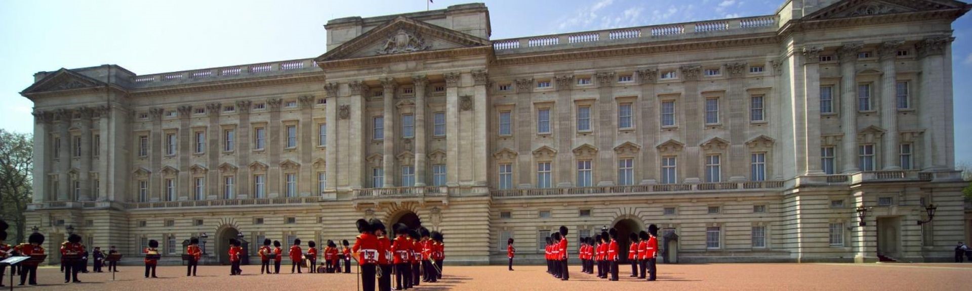 Buckingham Palace in London, the official residence of the British monarch, with the Victoria Memorial and the ceremonial gates in the foreground