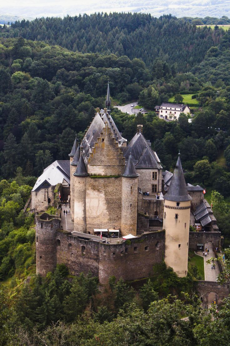 The magnificent Vianden Castle rising above the medieval town of Vianden in the Our Valley, one of the best-preserved medieval castles in western Europe