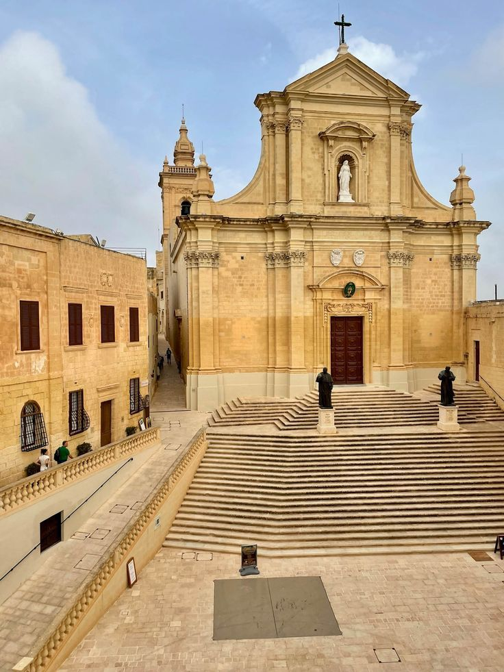 The ancient Citadel of Victoria rising above the rooftops of Gozo, Malta's sister island, its golden limestone walls dominating the landscape of the entire island