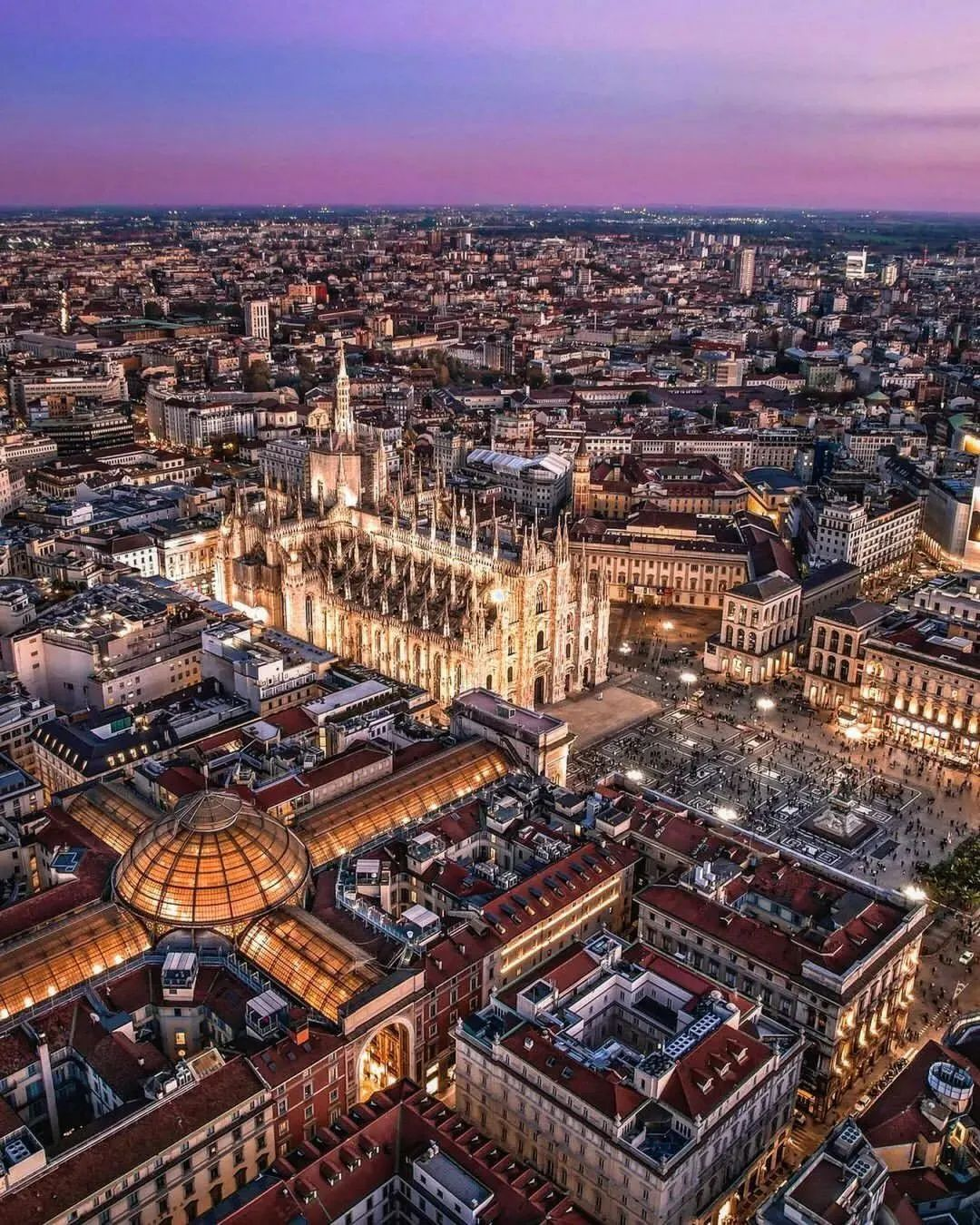 The magnificent Duomo di Milano, the largest Gothic cathedral in Italy, under a dramatic sky