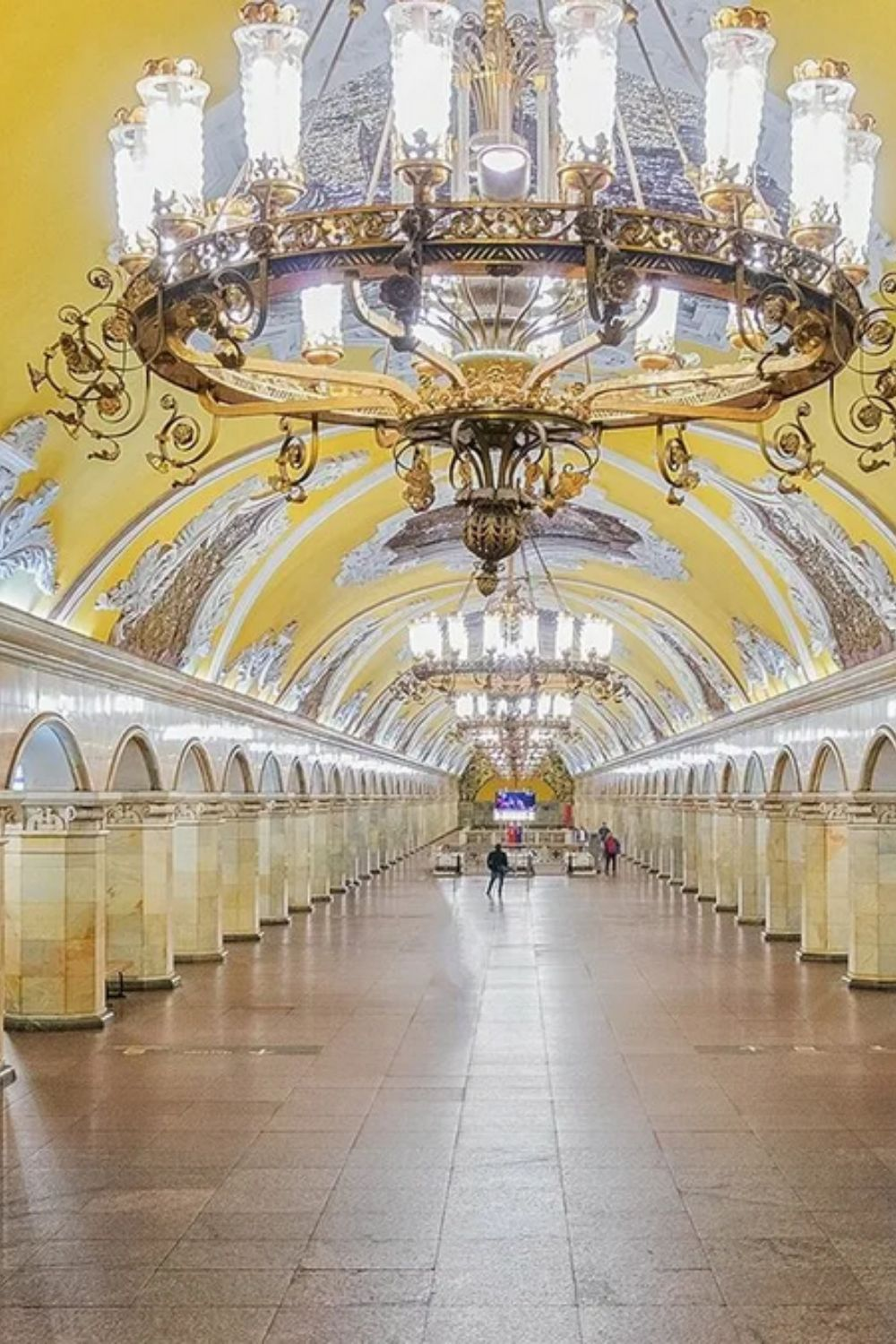 The extraordinary interior of Komsomolskaya station on the Moscow Metro Circle Line, with its vaulted ceiling of gold mosaic panels depicting Russian military history and its white marble columns