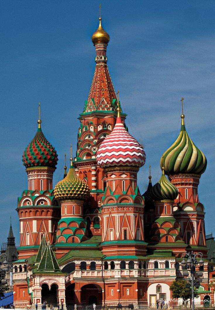 Red Square in Moscow, with the iconic multicoloured domes of Saint Basil's Cathedral and the Kremlin walls, one of the most recognisable and most magnificent public spaces in the world