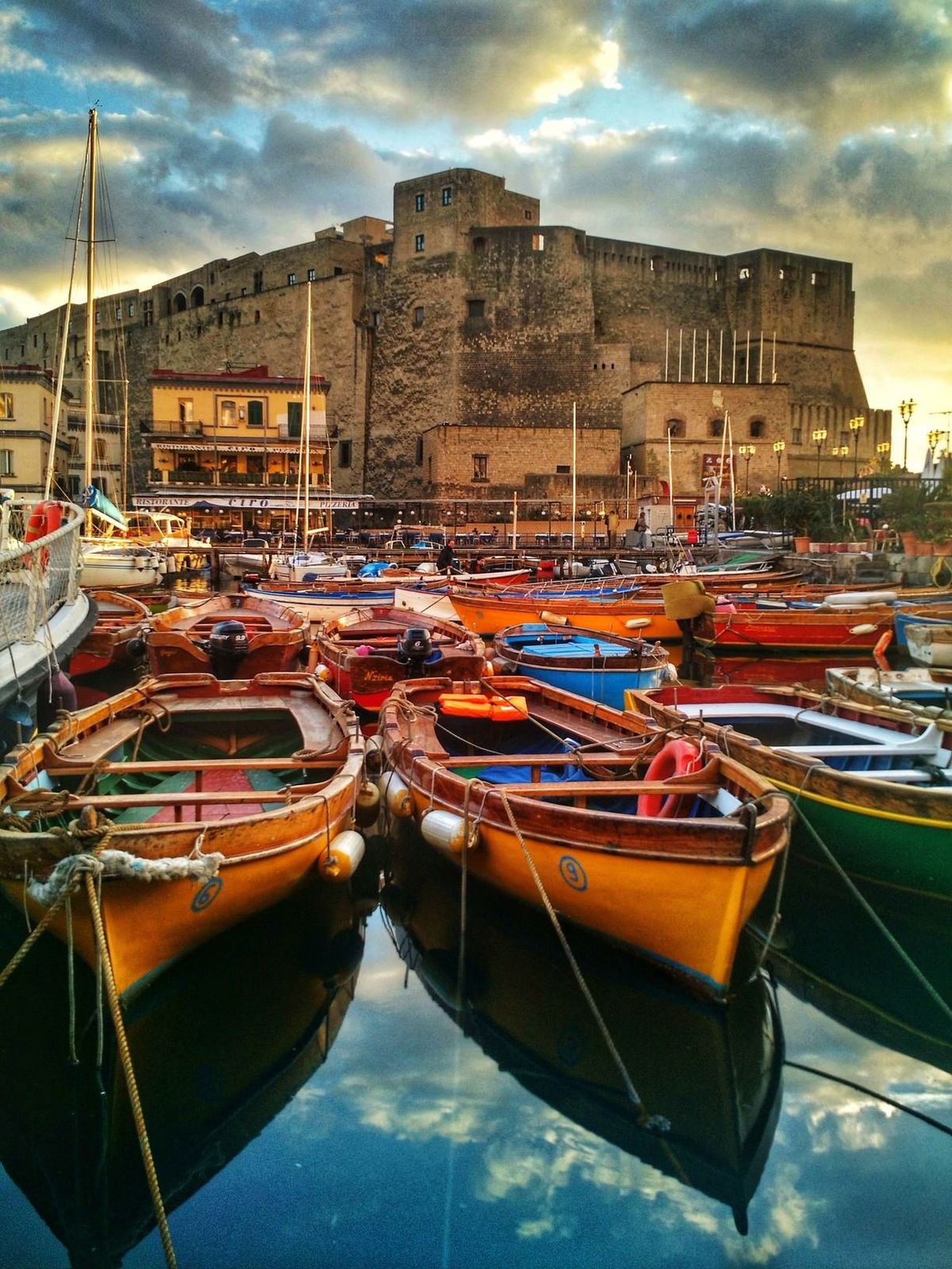 The vibrant streets of Naples with Mount Vesuvius rising in the distance, capturing the energy and history of Italy's most authentic city.