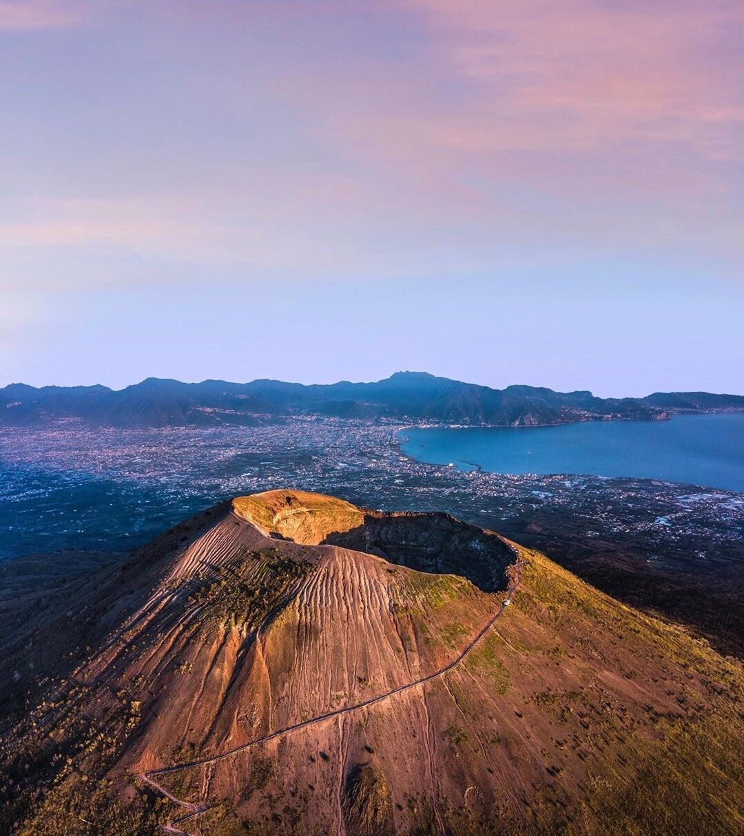 The smoking crater of Mount Vesuvius, the only active volcano on the European mainland, seen from the rim above Pompeii.
