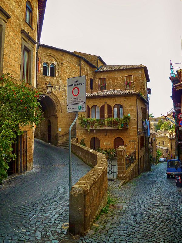 Orvieto on its dramatic tufa mesa in Umbria, the volcanic rock that has been carved and hollowed for three thousand years