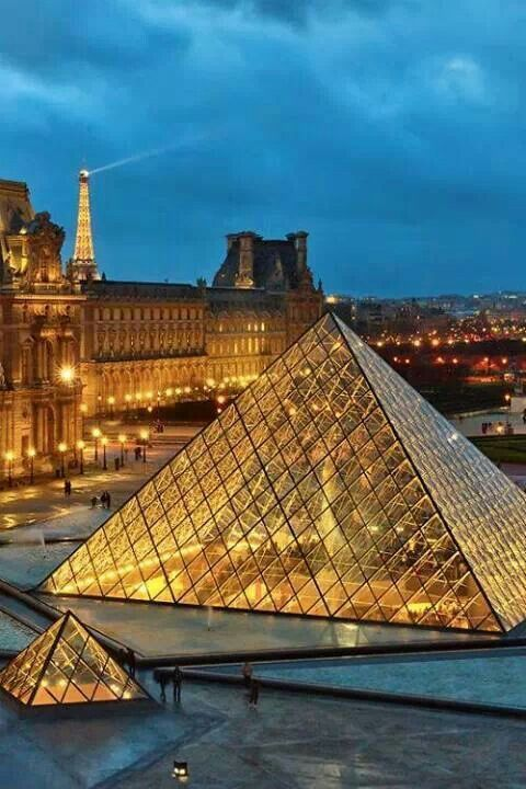 The Louvre Museum in Paris, seen through I.M. Pei's iconic glass pyramid entrance, the world's most visited museum and the institution that led the movement to ban selfie sticks in museum galleries