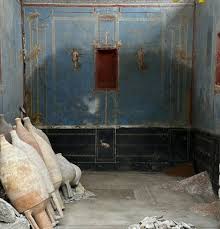 The Blue Walls Sanctuary at Pompeii, discovered in 2024, its intense Egyptian blue walls among the rarest decorative survivals from the ancient world