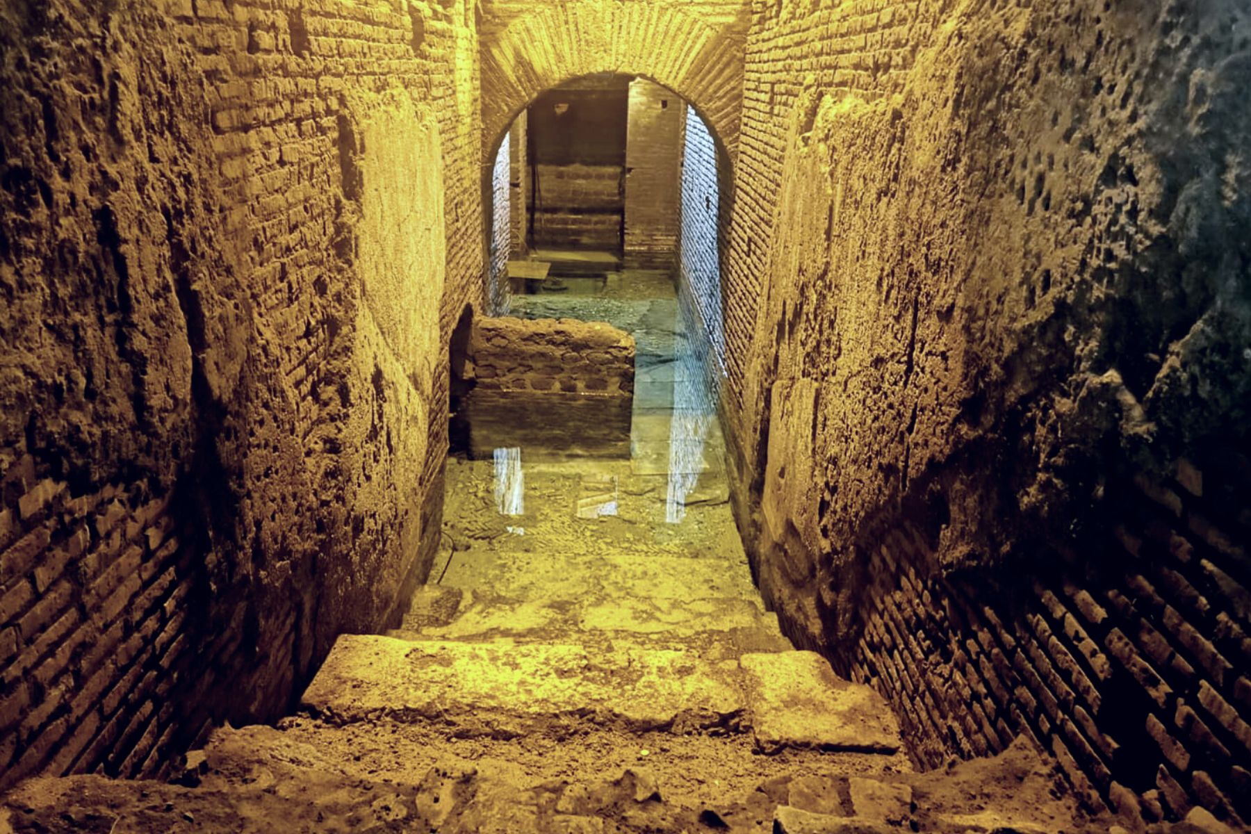 The channel of the Acqua Vergine aqueduct at the Vicus Caprarius archaeological site beneath the Trevi Fountain area in Rome