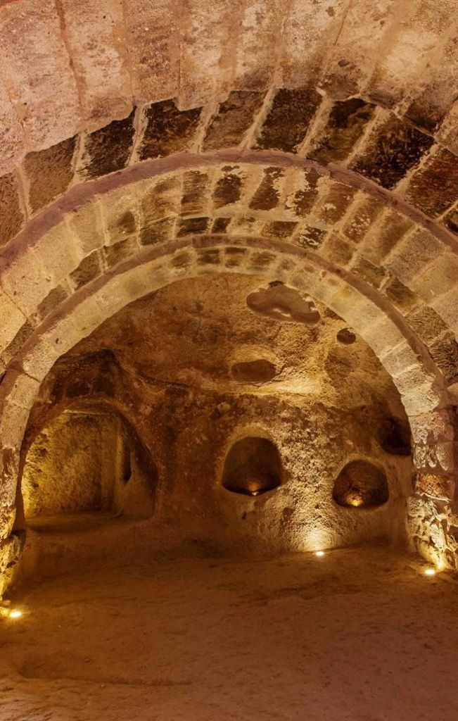 Underground galleries carved in Roman tuff, part of the network of over 7,000 mapped cavities beneath the streets of Rome