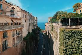 The dramatic tuff cliffs of Sorrento above the Bay of Naples, with lemon groves on the terraces