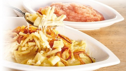 Alplermagronen: the traditional Swiss Alpine macaroni dish with cheese, potatoes, bacon and crispy fried onions