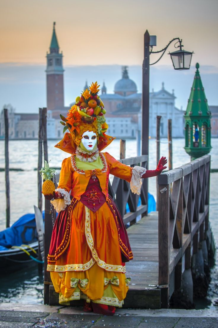 Traditional Venetian carnival masks in St Mark Square, Venice, a spectacle of colour, history and mystery