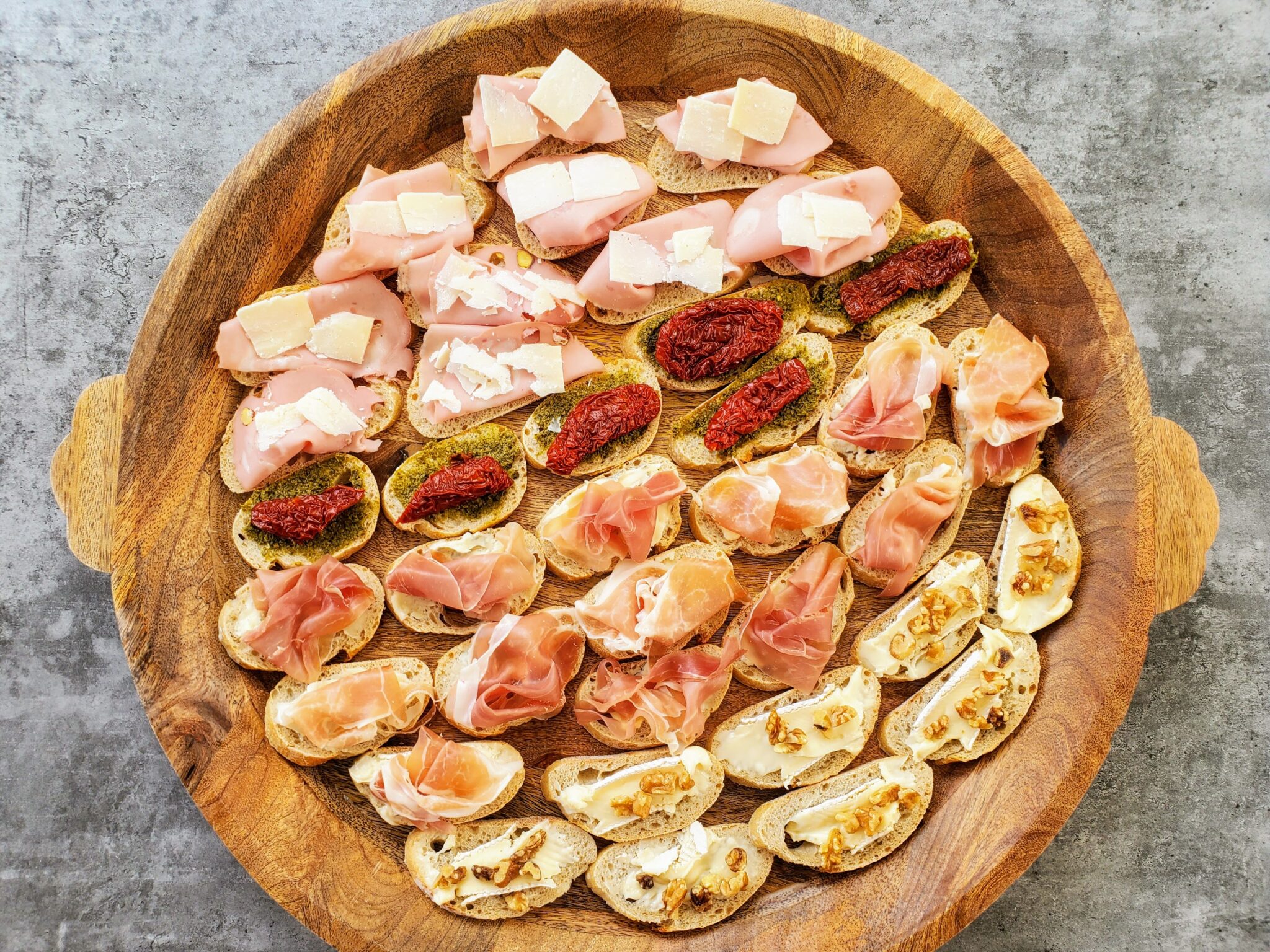 A spread of traditional Venetian cicchetti at a bacaro near the Rialto market in Venice