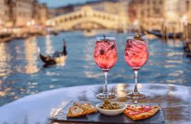 Traditional Venetian cicchetti and seafood dishes at a bacaro in Venice