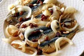 Sarde in saor, the iconic Venetian dish of sardines marinated with onions, vinegar, raisins and pine nuts