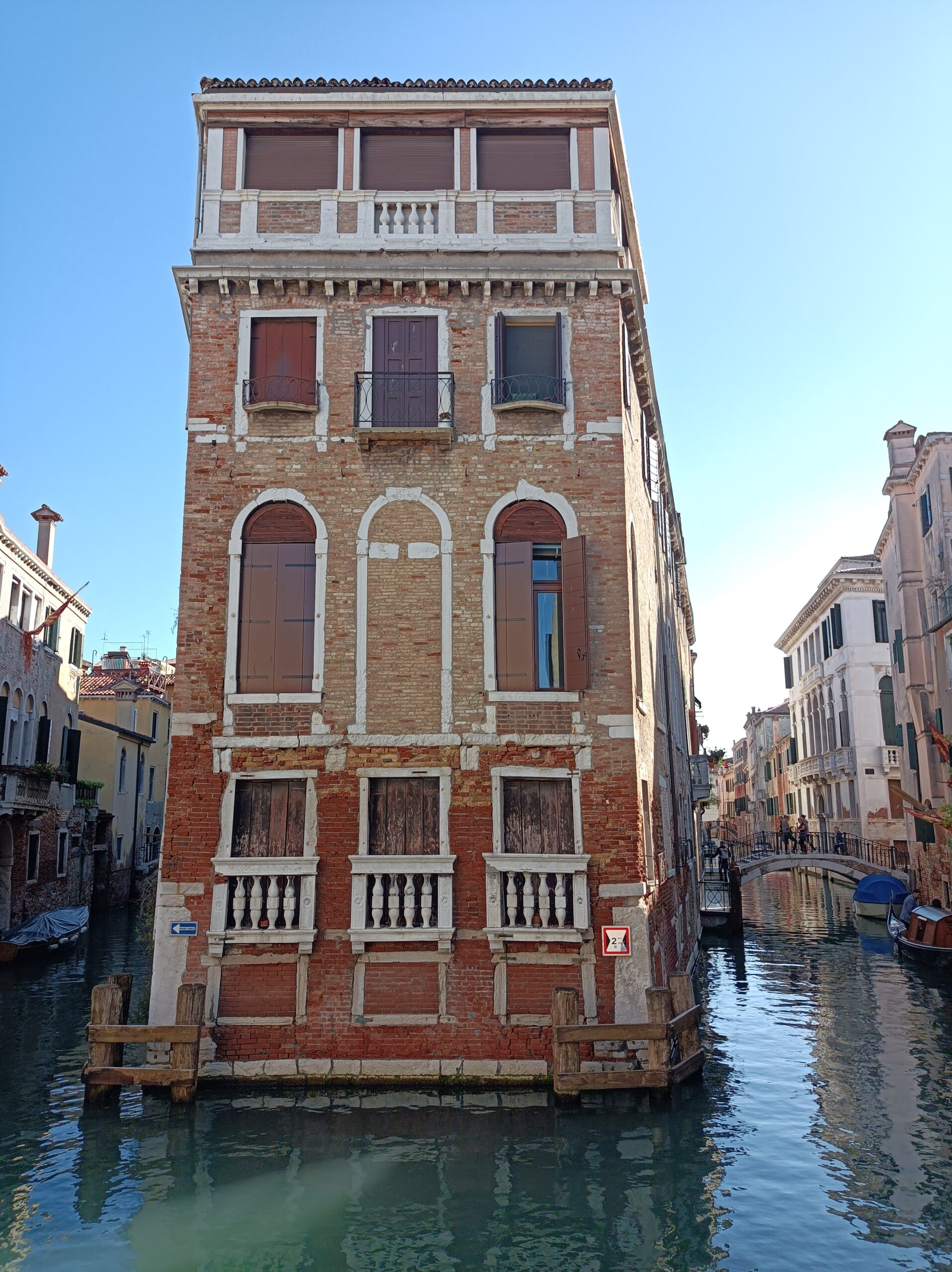 Venice at golden hour, the canals and rooftops of the floating city