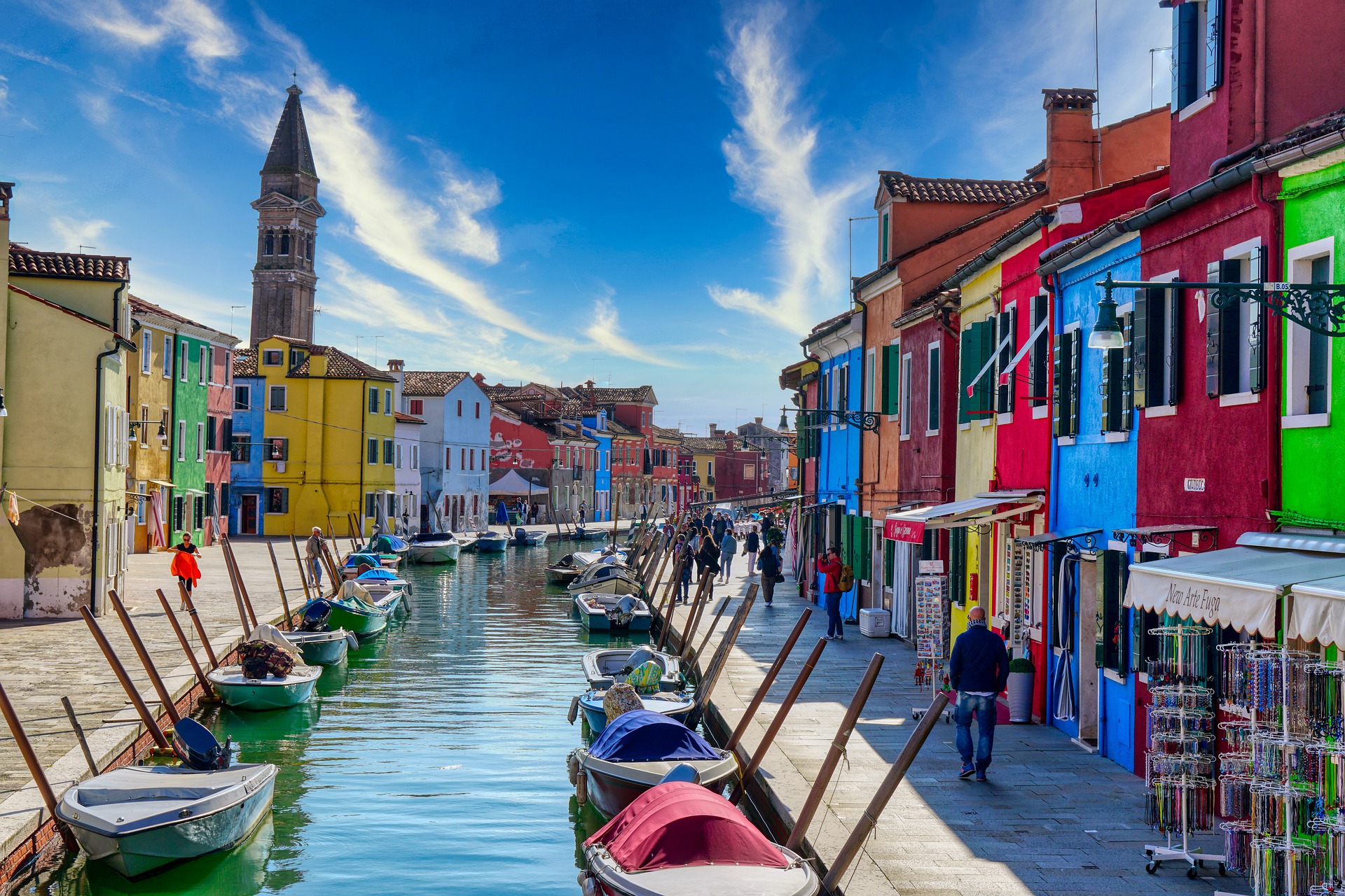 The brightly coloured houses of Burano in the Venice lagoon, one of the most photogenic places in Italy