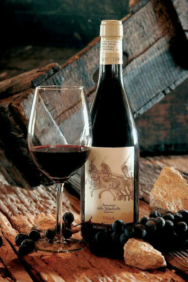 A glass of Amarone wine in the Valpolicella hills near Verona